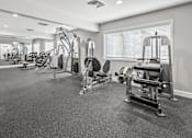 Thumbnail 14 of 20 - the gym is equipped with cardio equipment and weights at McDonogh Township Apartments, Owings Mills, MD