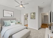 Thumbnail 9 of 41 - a bedroom with a large bed and a ceiling fan at Fortress Grove, Tennessee, 37128