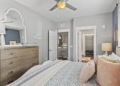 Thumbnail 5 of 38 - Bedroom with bed and thowpillows at Central Island Square, Daniel Island, SC, 29492