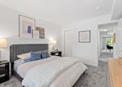 Thumbnail 11 of 25 - a bedroom with a bed and a closet at Courthouse Square Apartments, Towson, 21286