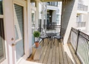 Thumbnail 7 of 30 - Patio with table and chair set at Sycamore at Tyvola, Charlotte, 28217