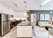Thumbnail 2 of 18 - kitchen and living room at Dartmoor Place at Oxford Square Apartments, Hanover
