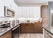 Thumbnail 1 of 18 - Kitchen at Dartmoor Place at Oxford Square Apartments, Hanover, MD 21076