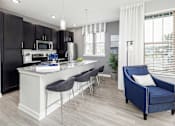 Thumbnail 1 of 25 - Kitchen with bar area at Elevate at Brighton Park, Summerville, 29486