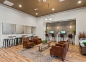 Thumbnail 35 of 41 - community room with seating and a wall with computers at Fortress Grove, Murfreesboro, TN