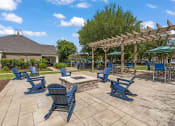 Thumbnail 25 of 41 - FIrepit with blue chairs surroundingat Fortress Grove, Murfreesboro, Tennessee