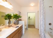 Thumbnail 21 of 41 - a bathroom with a sink and a bathtub at Fortress Grove, Tennessee, 37128