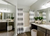 Thumbnail 15 of 41 - bathroom with sink and shower with curtain at Fortress Grove, Murfreesboro, TN, 37128
