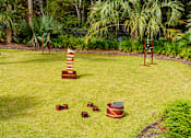 Thumbnail 16 of 26 - Outdoor game area at The Reserve at Mayfaire Apartments, Wilmington NC
