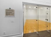 Thumbnail 17 of 22 - racquetball court at Henley Tampa Palms Apartments, Tampa, 33647