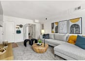 Thumbnail 9 of 19 - Spacious living room with sectional sofa at Donnybrook Apartments, Maryland, 21286