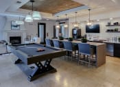 Thumbnail 38 of 54 - Resident lounge with billiards tables at Two Addison Place Apartments , Pooler, GA