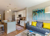Thumbnail 3 of 21 - room with couch and kitchen island at 1010 Dilworth Apartments, Charlotte