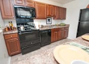 Thumbnail 18 of 36 - Eat-in Kitchens at Kenilworth at Perring Park Apartments, Parkville, MD