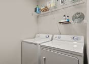 Thumbnail 11 of 41 - a washer and dryer in the laundry room at Fortress Grove, Tennessee, 37128