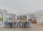 Thumbnail 27 of 38 - resident lounge with a large table and chairs at Central Island Square, Daniel Island, 29492