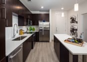 Thumbnail 8 of 26 - Fully Equipped And Furnished Kitchen at Millworks Apartments, Atlanta, 30318