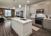 Thumbnail 11 of 26 - Spacious Full Size Kitchen at Millworks Apartments, Georgia, 30318