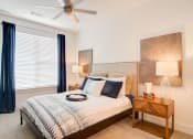 Thumbnail 15 of 26 - Bedroom With Ceiling Fan at Millworks Apartments, Atlanta, GA