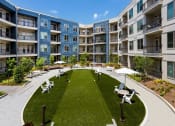 Thumbnail 4 of 26 - Open Play Area at Millworks Apartments, Georgia
