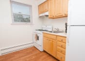 Thumbnail 7 of 14 - kitchen with cabinets at Mount Ridge Apartments, Baltimore MD