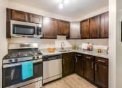 Thumbnail 11 of 31 - Renovated Kitchen at Padonia Village Apartments, Maryland
