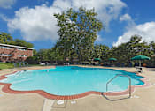 Thumbnail 16 of 23 - Pool with sundeck at Falls Village Apartments, Maryland, 21209