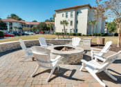 Thumbnail 28 of 54 - Firepit lounge at Two Addison Place Apartments , Pooler, 31322
