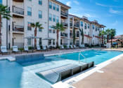 Thumbnail 21 of 54 - In water tanning ledge at Two Addison Place Apartments , Pooler
