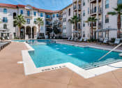 Thumbnail 22 of 54 - Resort style pool in center of community  at Two Addison Place Apartments , Pooler, Georgia