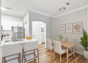 Thumbnail 5 of 33 - A kitchen with a table and chairs at Sweetgrass Landing, Mount Pleasant, South Carolina