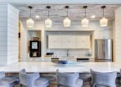 Thumbnail 20 of 27 - Resident Lounge Kitchen at The Bluestone Apartments, Bluffton, South Carolina
