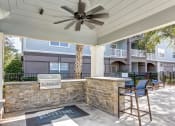 Thumbnail 14 of 27 - Outdoor Kitchen Plus Grilling Station at The Bluestone Apartments, South Carolina