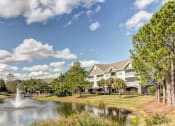 Thumbnail 17 of 27 - Sparking Lake Within Community at The Bluestone Apartments, Bluffton, South Carolina