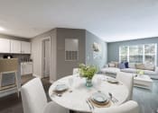 Thumbnail 3 of 20 - a living room and dining room with a table and chairs  at The Village Apartments, Raleigh, NC