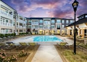 Thumbnail 7 of 27 - Resort-Style Pool at The Flats at Ballantyne Apartments, Charlotte