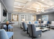 Thumbnail 28 of 33 - Resident lounge with tables and chairs  at St Mary's Square North Apartments, North Carolina, 27605