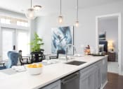 Thumbnail 3 of 33 - Kitchen island at St Mary's Square North Apartments, Raleigh, 27605