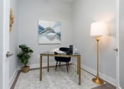 Thumbnail 14 of 33 - Den with desk and chair at St Mary's Square North Apartments, North Carolina