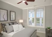 Thumbnail 17 of 33 - Guest bedroom with bed and window at St Mary's Square North Apartments, North Carolina, 27605