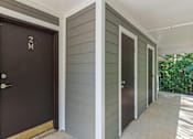 Thumbnail 29 of 46 - A row of doors with the first one labeled 2M.