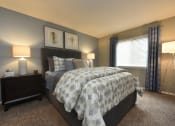 Thumbnail 32 of 39 - Apartments Near Regions Field - MarQ Vestavia - Bedroom with Carpet Flooring and Large Window