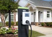 Thumbnail 24 of 50 - a charging station for a bank kiosk in front of a house