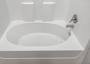 Thumbnail 69 of 91 - A white sink in a bathroom with a silver faucet.