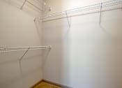 Thumbnail 89 of 91 - Empty white shelves in a room.