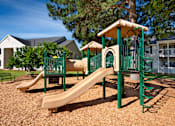 Thumbnail 17 of 43 - the playground at the preserve at polk apartments with a slide