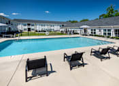 Thumbnail 25 of 46 - our apartments have a resort style pool with lounge chairs