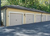 Thumbnail 33 of 91 - A row of garage doors are closed.