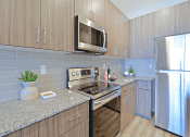 Thumbnail 26 of 73 - Chef-Inspired Kitchens Feature Stainless Steel Appliances at Scottsdale Hayden Townhomes, Scottsdale, AZ, 85257