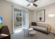 Thumbnail 40 of 73 - a living room with a couch and coffee table at Scottsdale Hayden Townhomes, Scottsdale